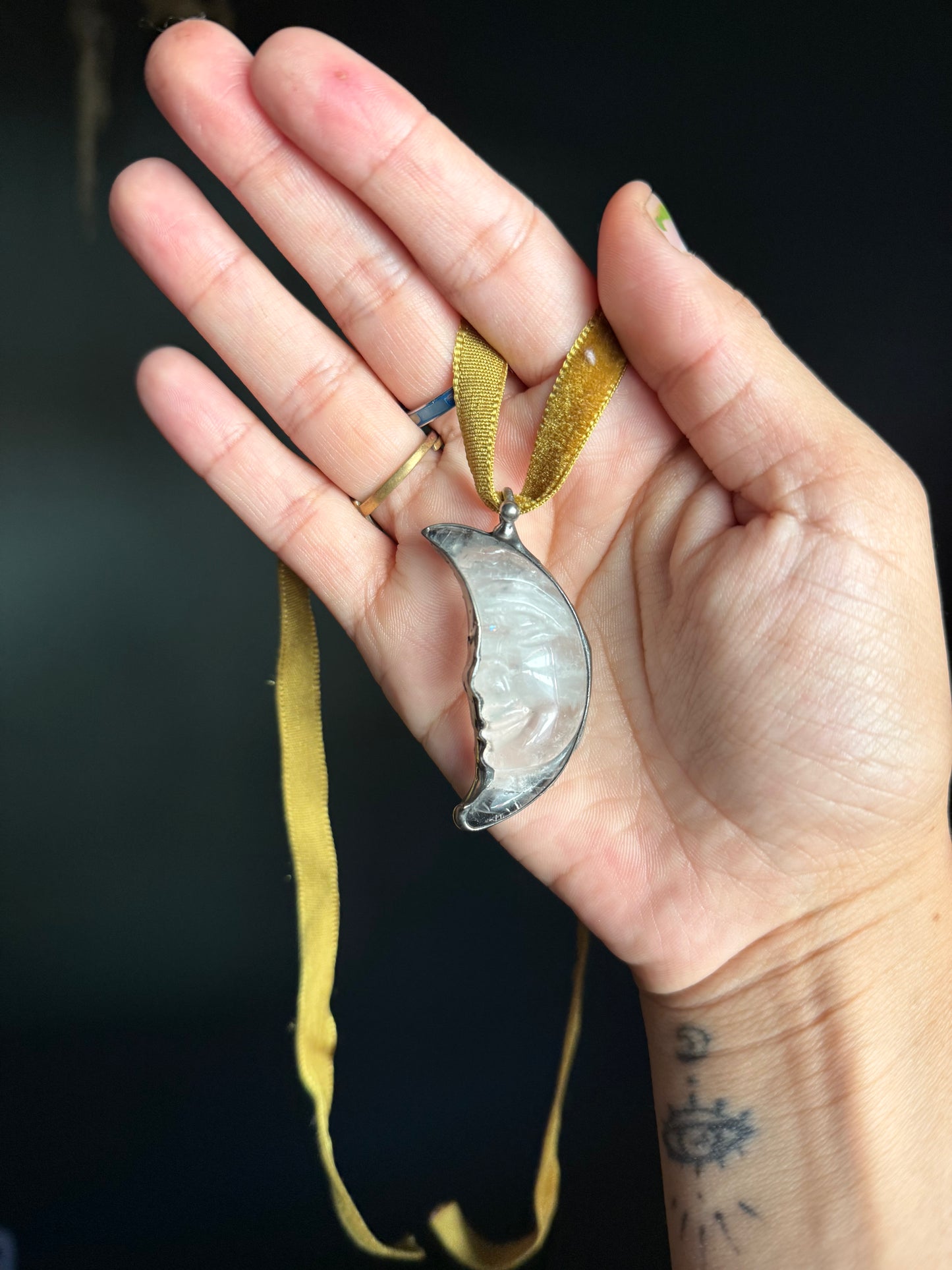 The grinning moon necklace